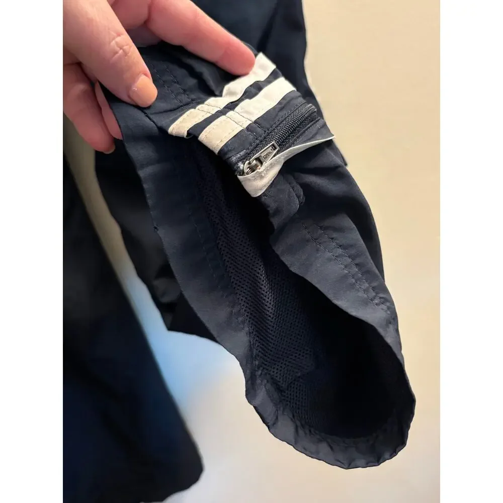 Men’s Adidas black track style pants with mesh lining